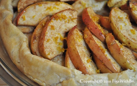 photo detail of rustic apple tart with cinnamon and lemon zest