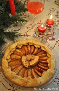 photo of rustic apple tart on christmas dinner table