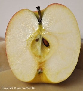 photo of Sundowner Apple sliced in half