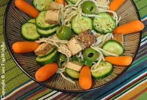 Leftover spaghetti noodles are a great start for creating a quick tasty salad with tofu, cucumbers, olive and carrots.