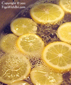 meyer lemon slices boiling in water or sugar syrup