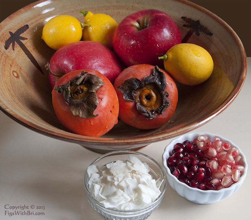 winter fruit bowl with dried coconut flakes