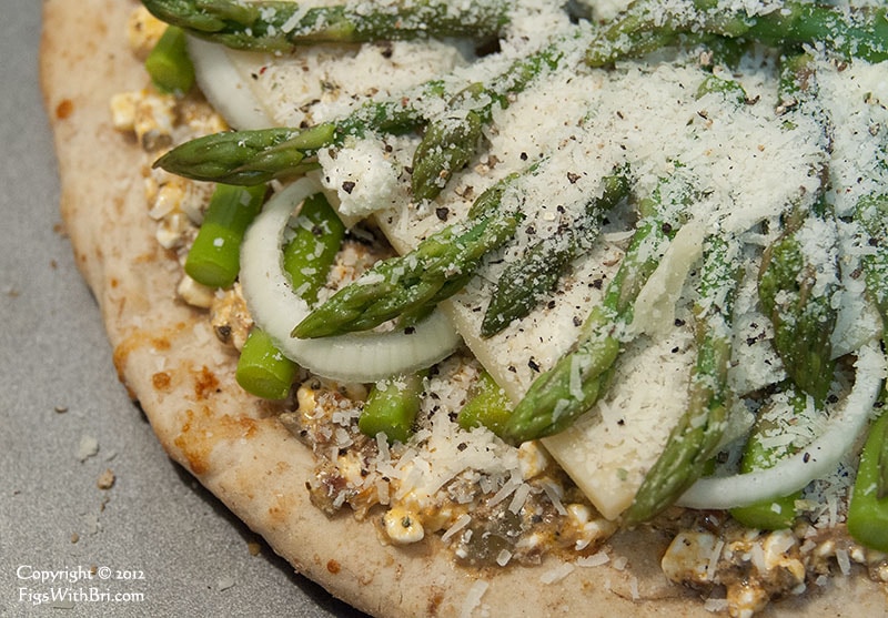 asparagus tips with a generous garnish of grated parmesan pizza garnish